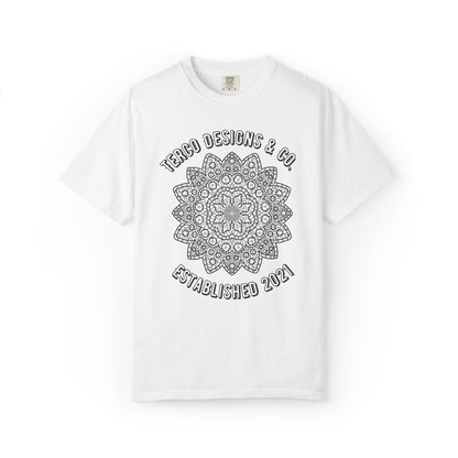 White t-shirt with black mandala design and text on a white background